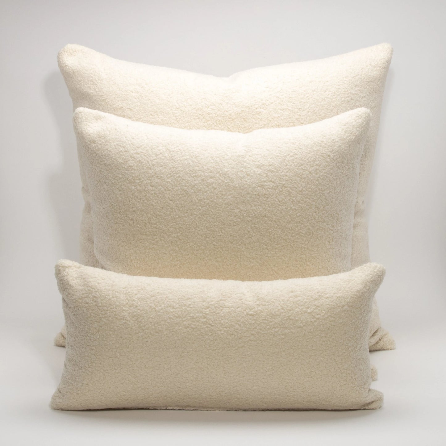 Cream Textured Kidney Pillow By MOGUL