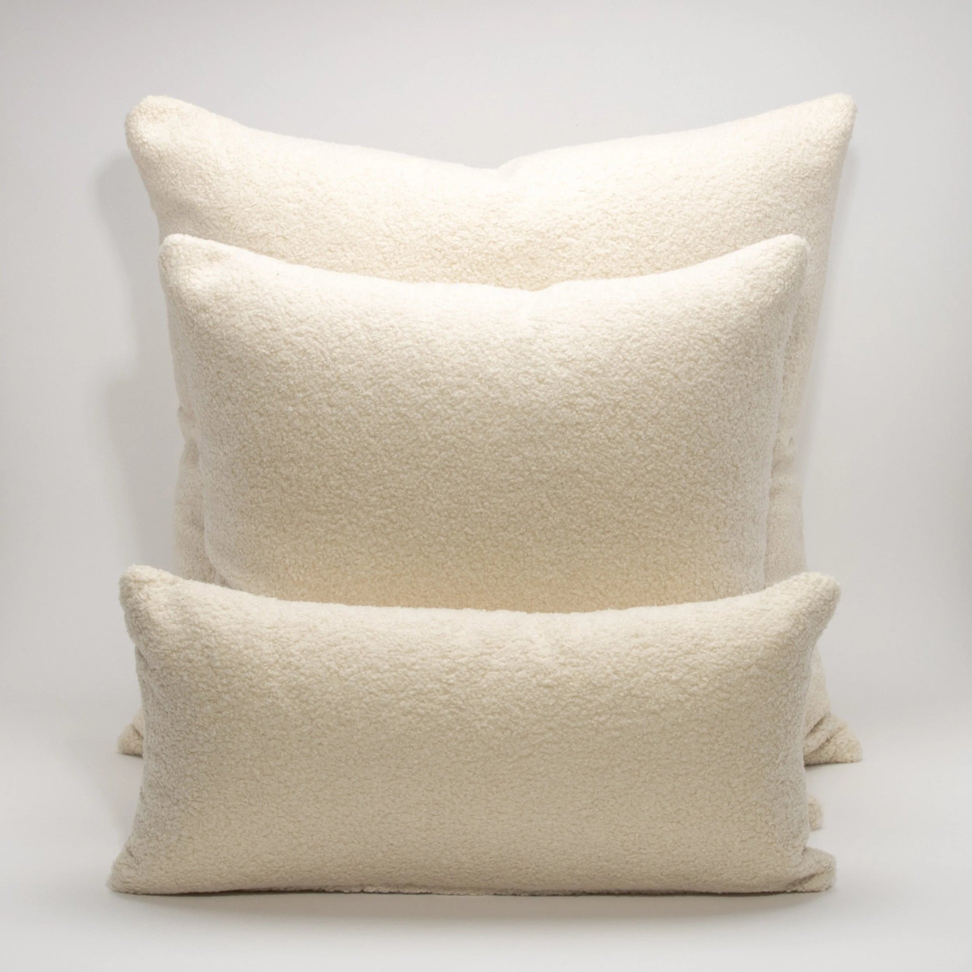 Cream Textured Kidney Pillow By MOGUL