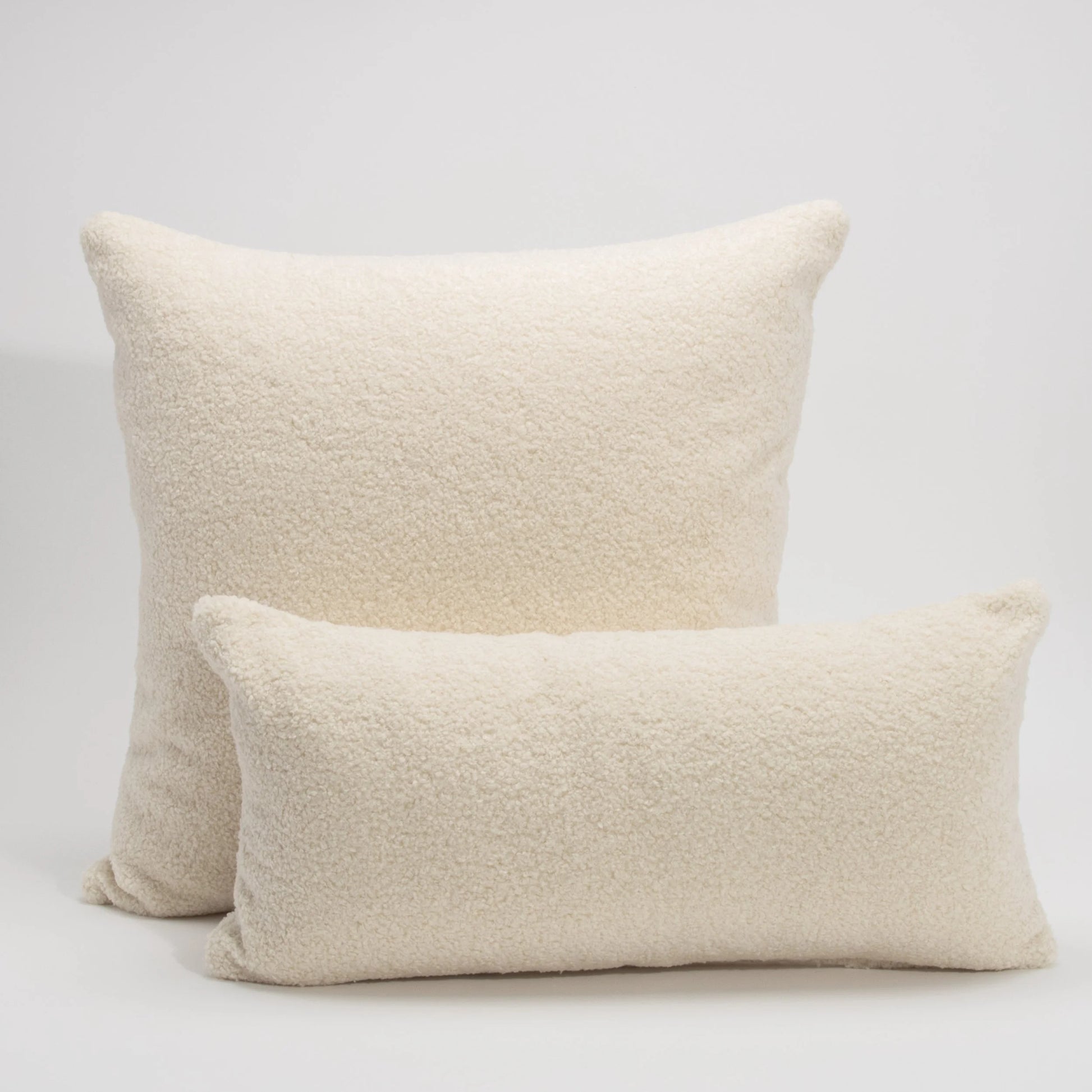 Cream Textured Kidney Pillow By MOGUL