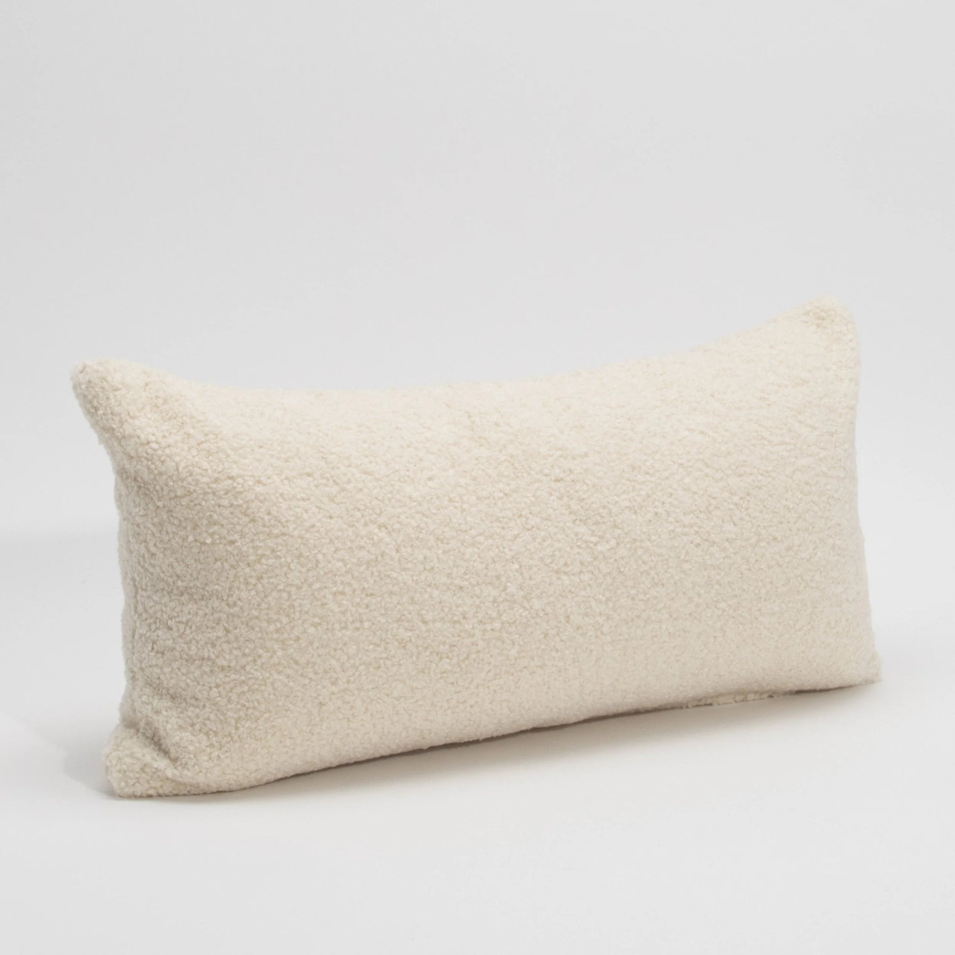 Cream Textured Kidney Pillow By MOGUL