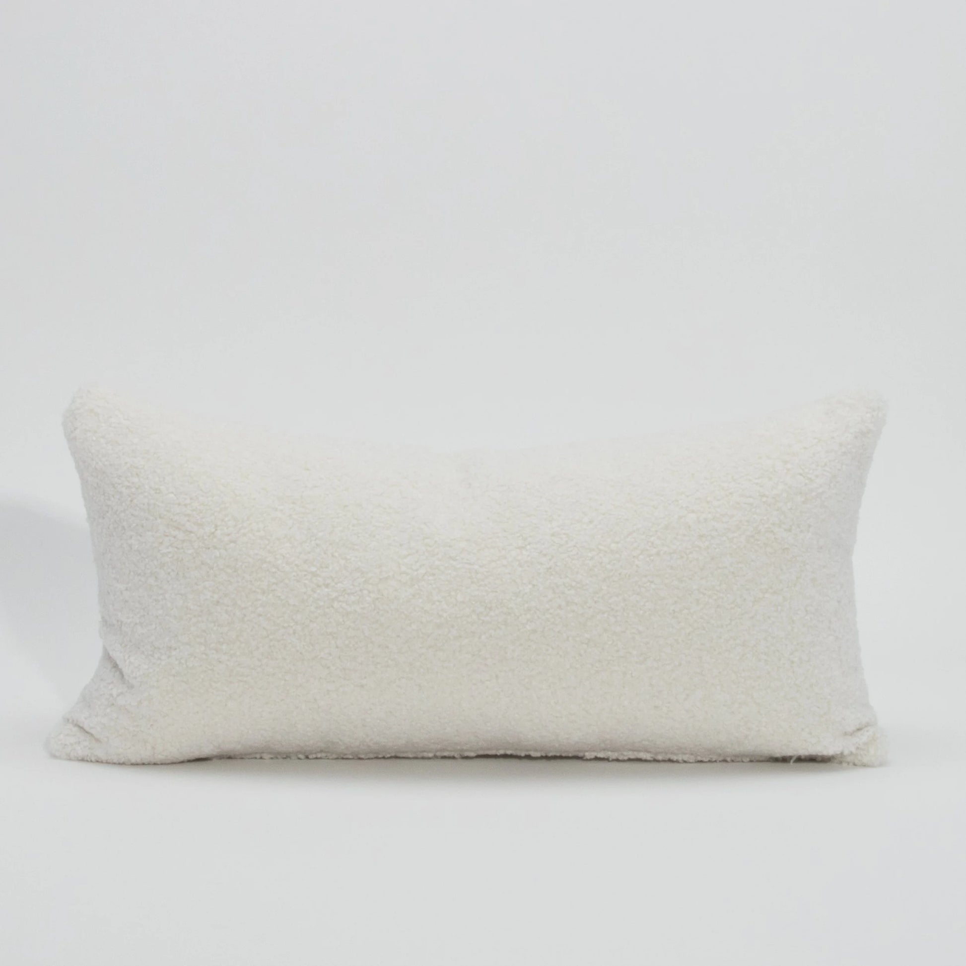 White Textured Kidney Pillow By MOGUL