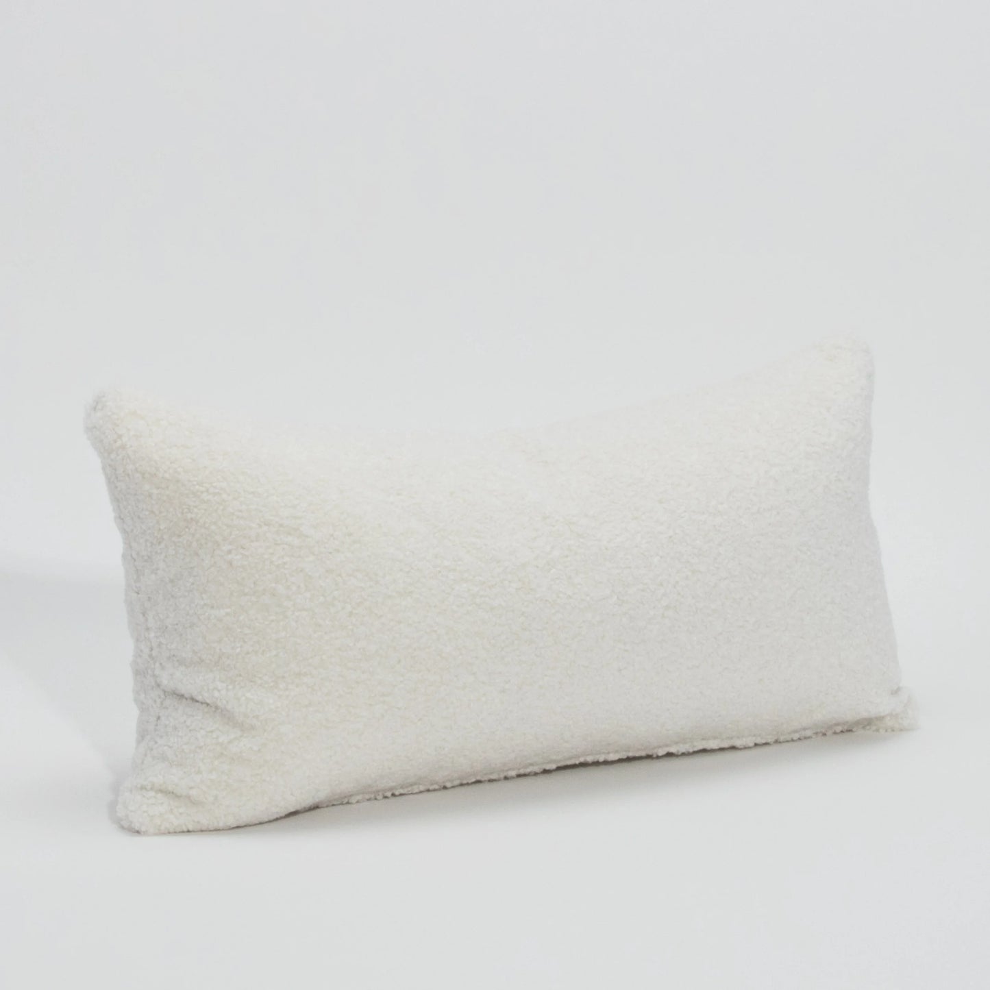 White Textured Kidney Pillow By MOGUL