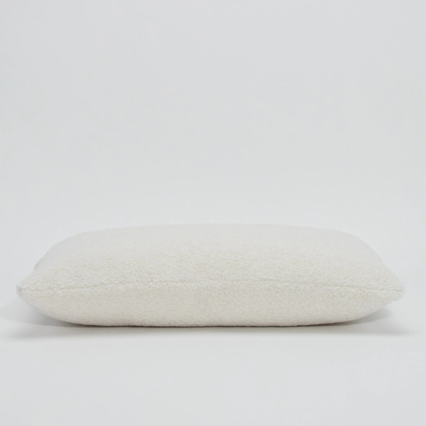 White Textured Kidney Pillow By MOGUL