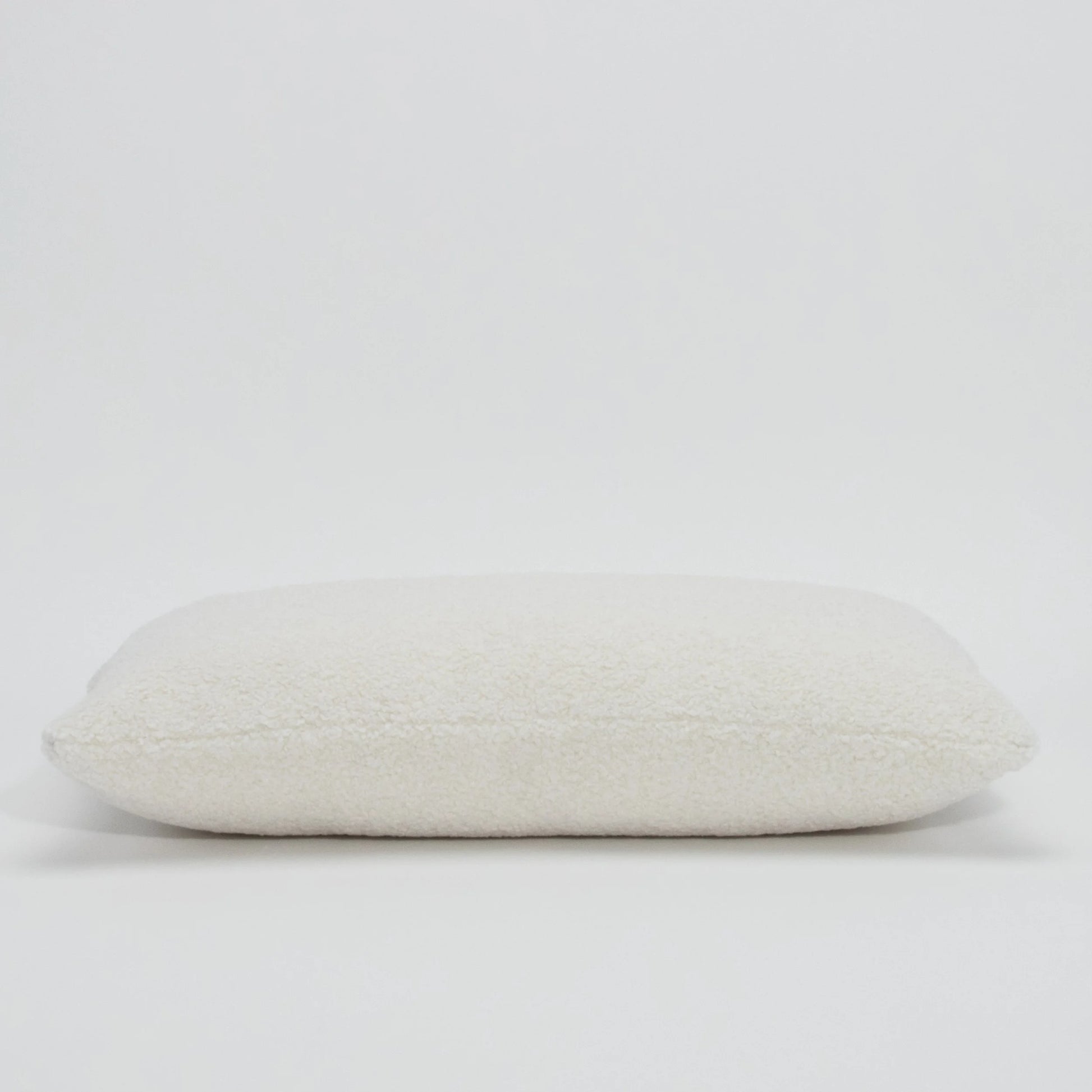 White Textured Kidney Pillow By MOGUL